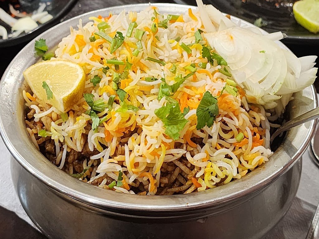 Sitara Biryani Point biryani in a handi pot