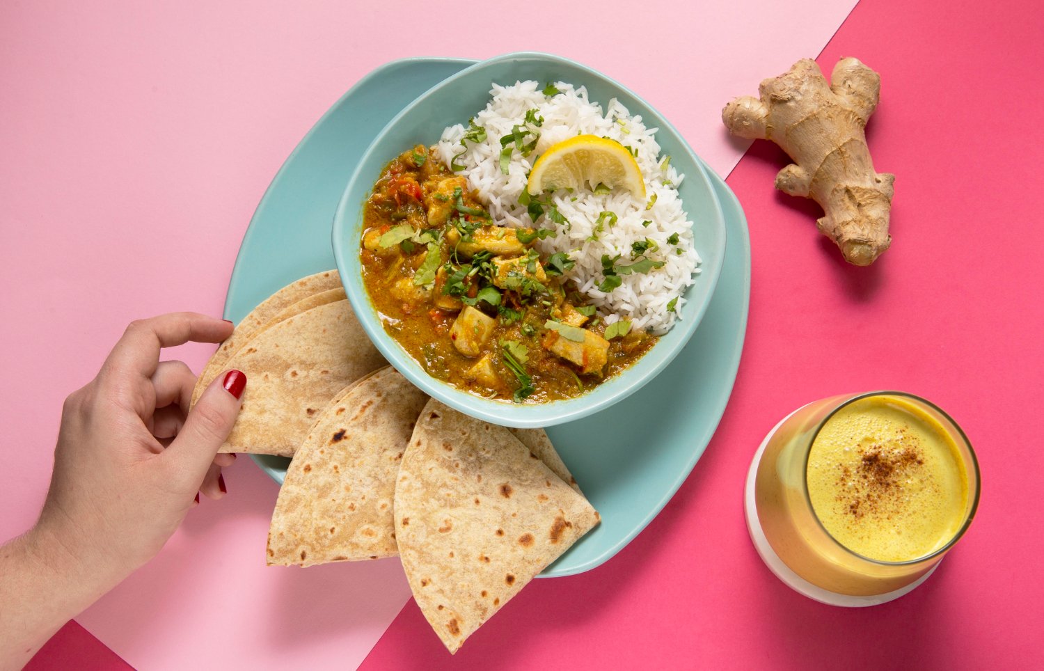 THALIRAAGA Indian thali bowl with curry rice and roti