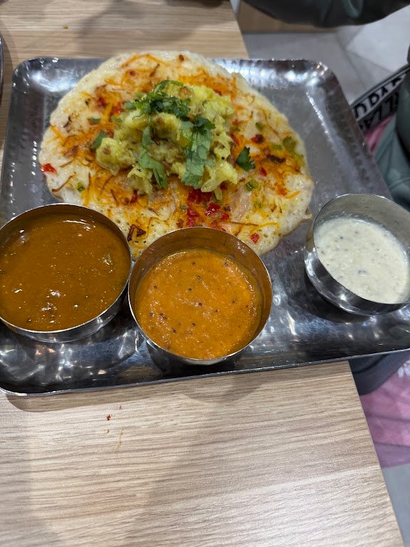 The Royal Udupi masala dosa with chutney and sambar