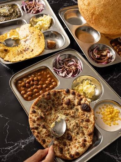 Amritsari Dhaba Doonside kulcha thali with chole, onions and pickles