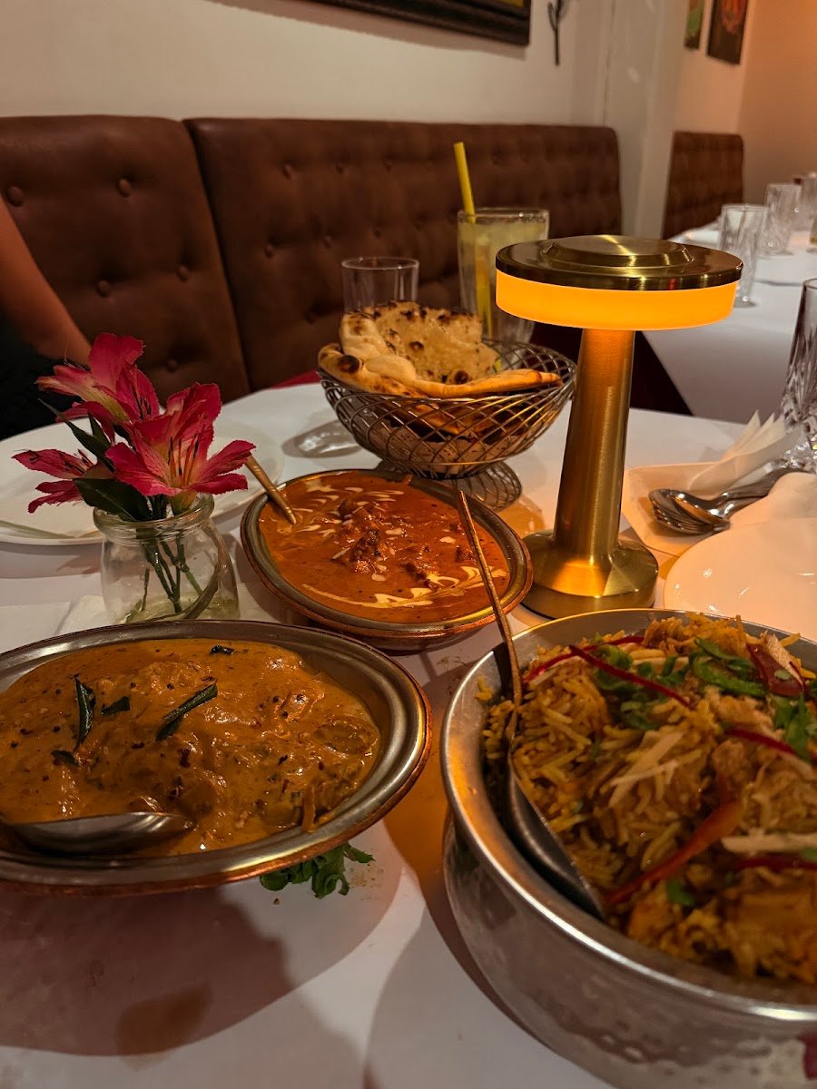 Castle Taj butter chicken and biryani spread