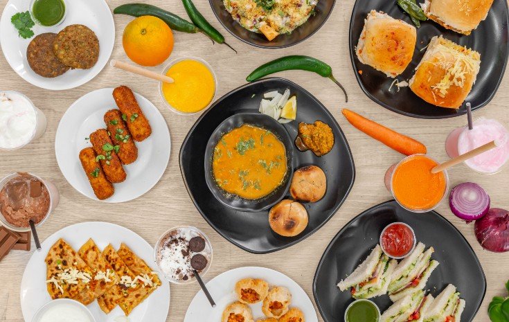 Chai Nashta Pendle Hill Rajasthani dal bati churma spread