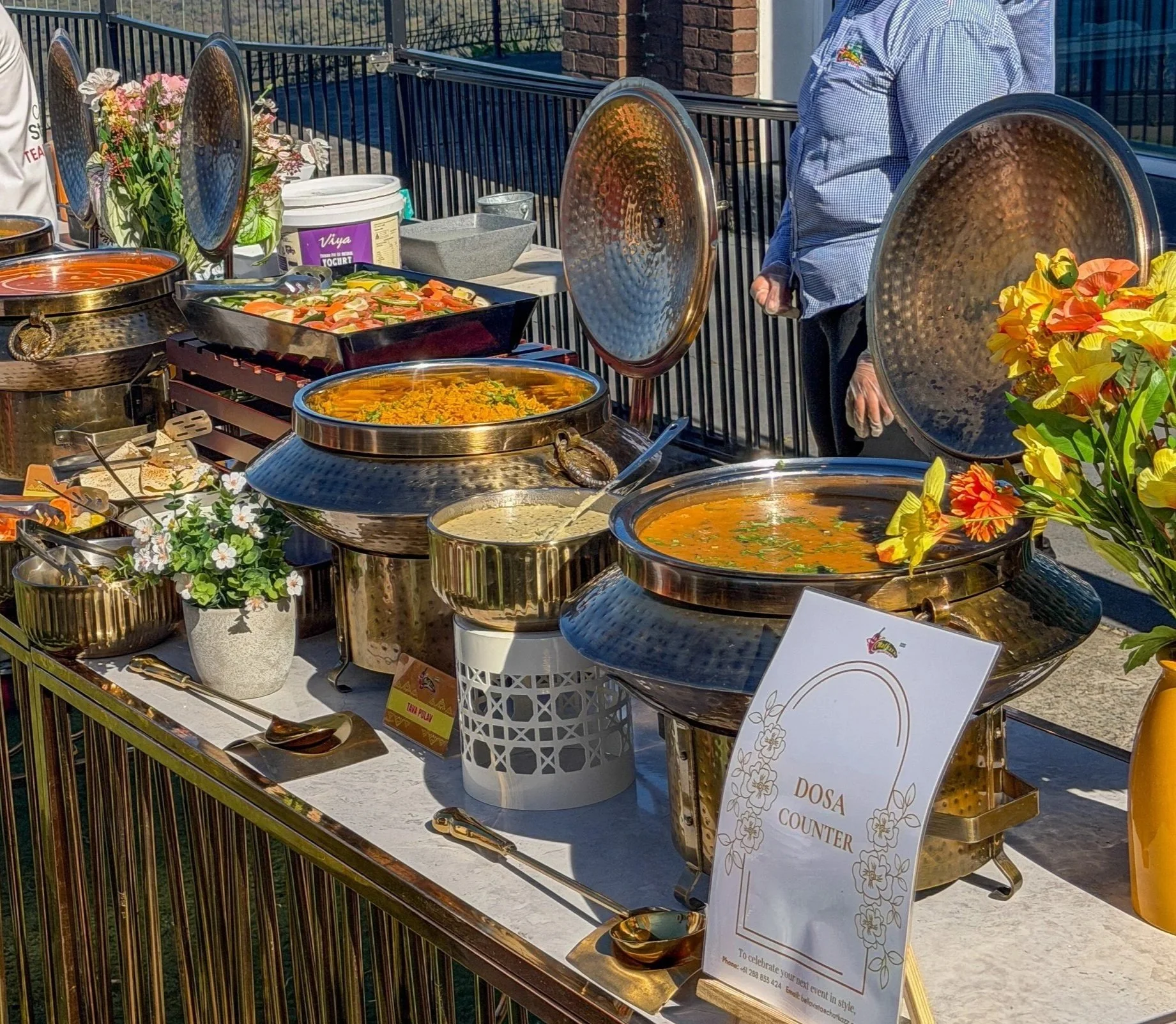 Chatkazz live Dosa Counter catering setup with chafing dishes at an outdoor Sydney event
