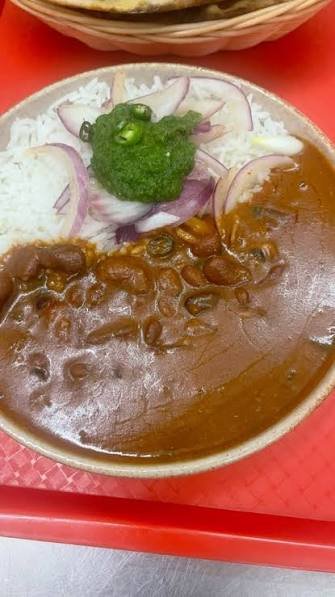 Dilli Delights Tiffin rajma chawal with rice, kidney bean curry, onion and chutney