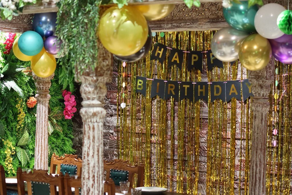 The Grand Palace Sydney CBD table decorated for a birthday celebration with balloons