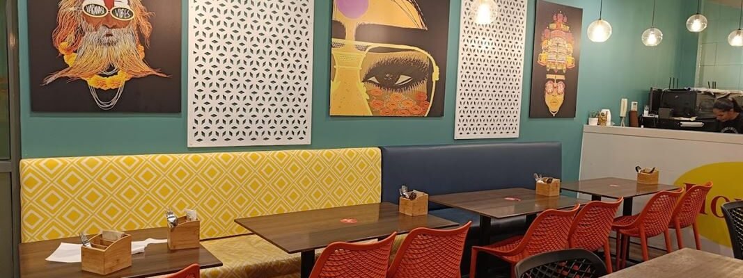 Honest Indian Bella Vista colourful dining room with booth seating for groups