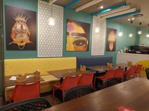 Honest Indian Bella Vista colourful dining room with booth seating for groups