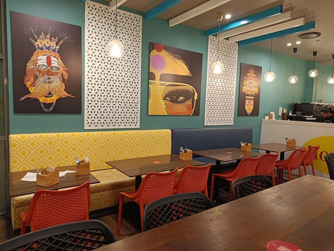 Honest Indian Bella Vista colourful dining room with booth seating for groups