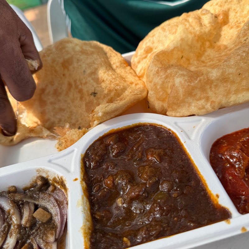 Manraj Tandoori Junction chole bhature with bhature and onions