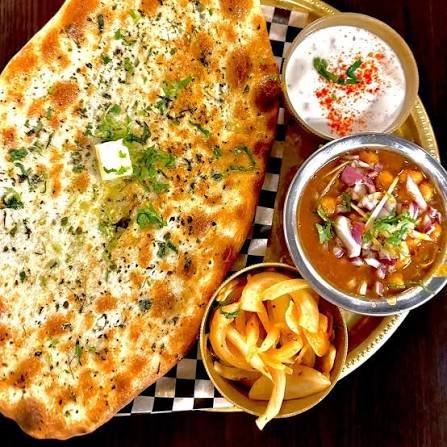 Naan House Glebe Amritsari paneer kulcha with raita, chana masala and fries
