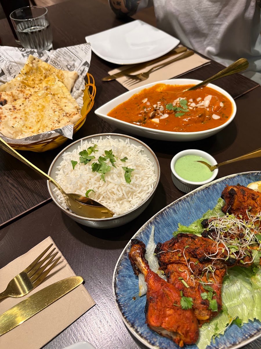 Panchayat Indian Restaurant butter chicken with naan and tandoori chicken