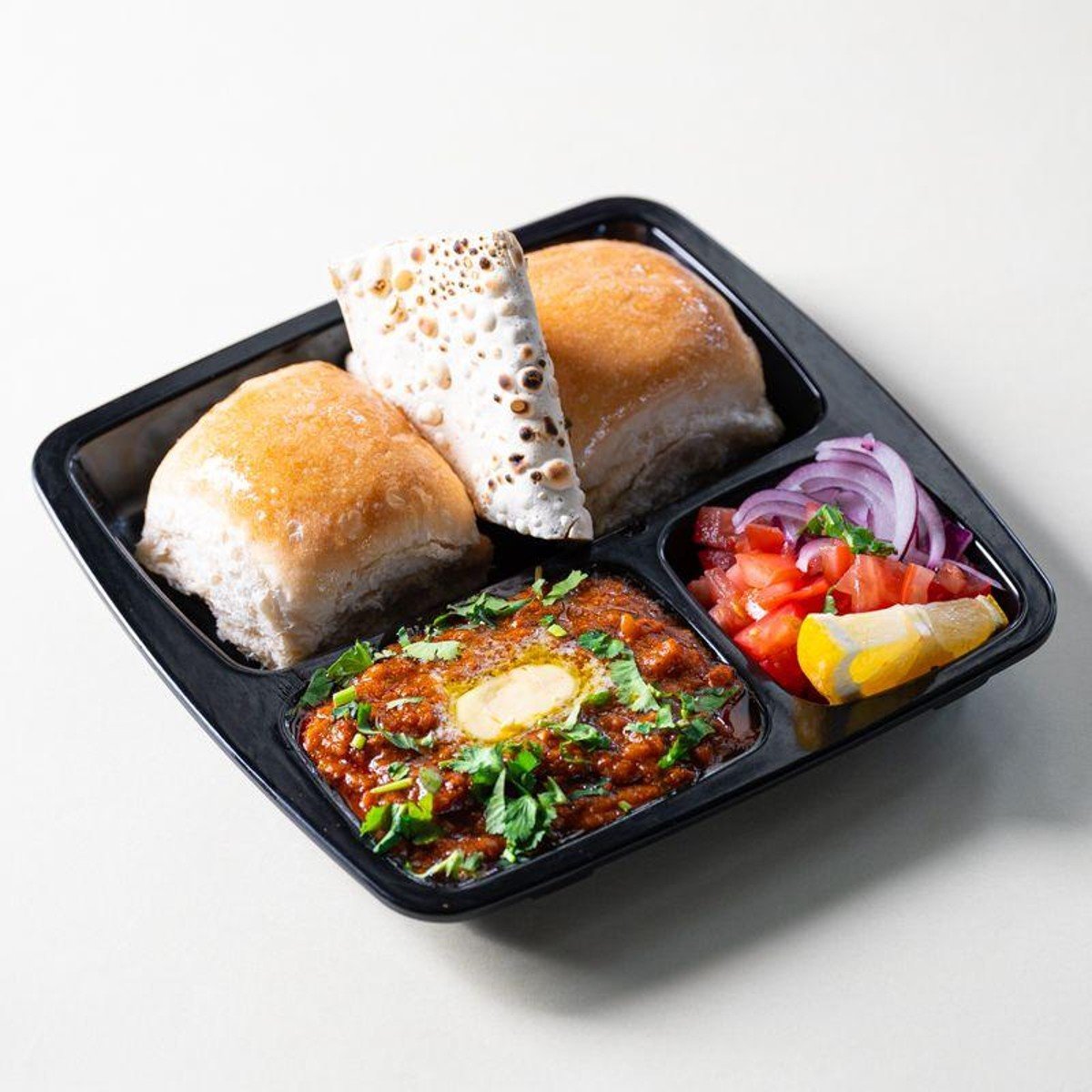 Radhe Chatpata House Blacktown pav bhaji with pav rolls onion and lemon