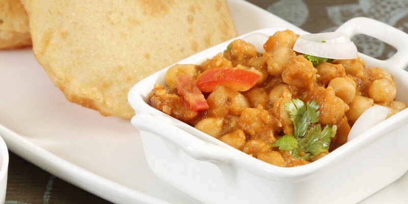 Radhe Chatpata House chole bhature with lime and onion