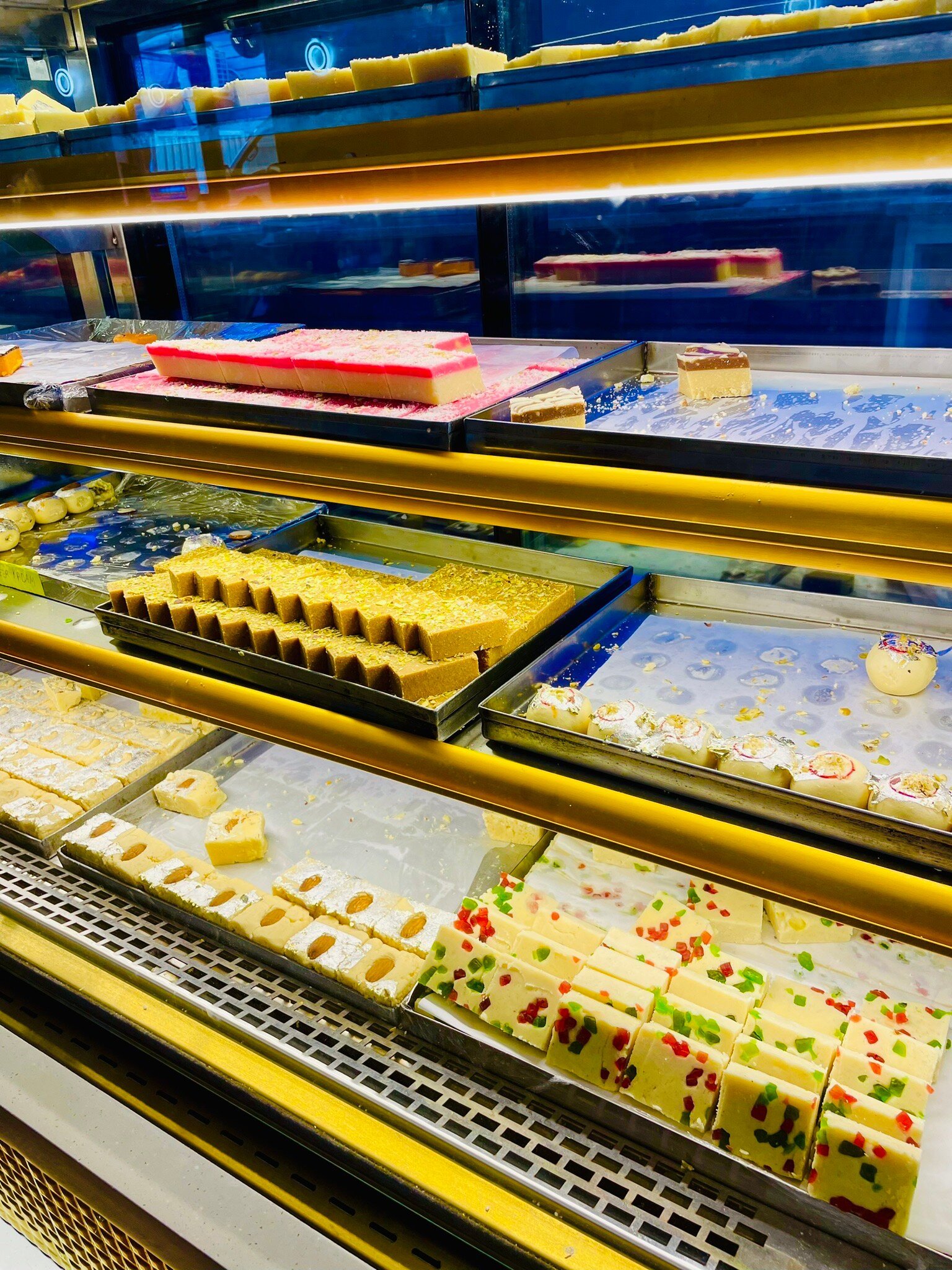 Taj Indian Sweets and Restaurant Harris Park glass mithai counter with barfi and milk cake
