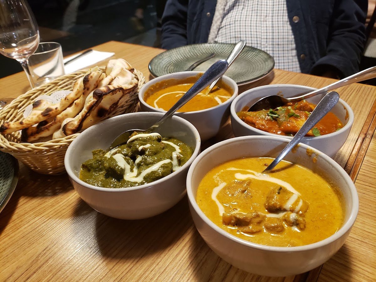 The Spice Room butter chicken curries with naan