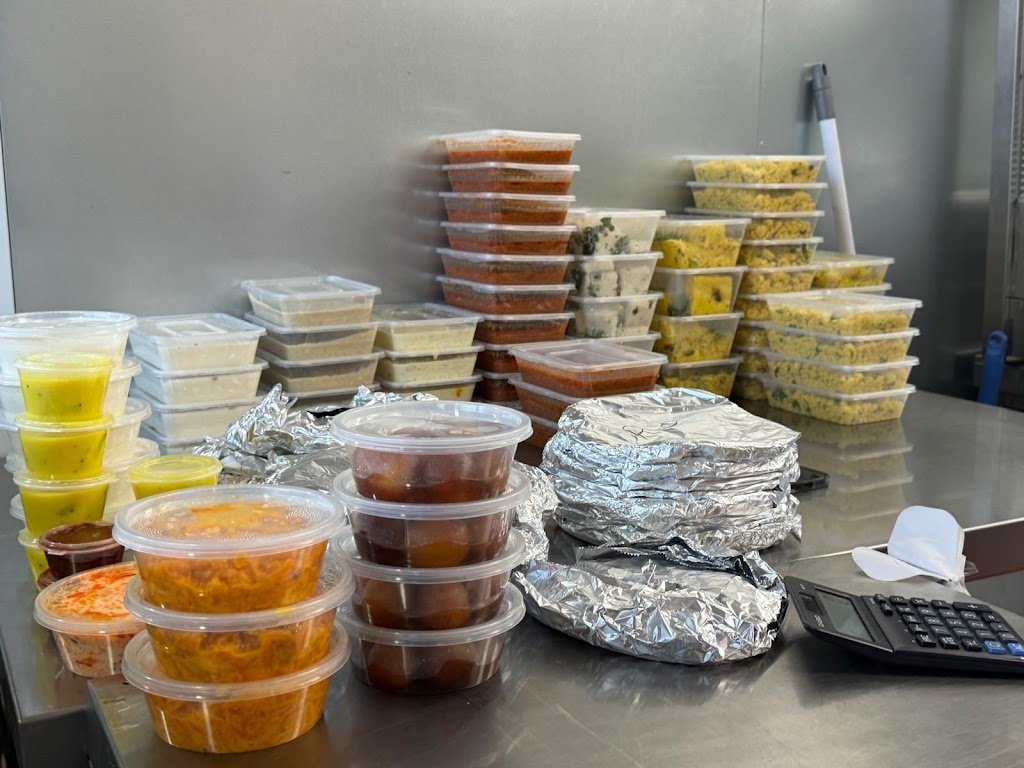 Tikha Tadka Harris Park homemade Gujarati tiffin containers with dhokla and curries